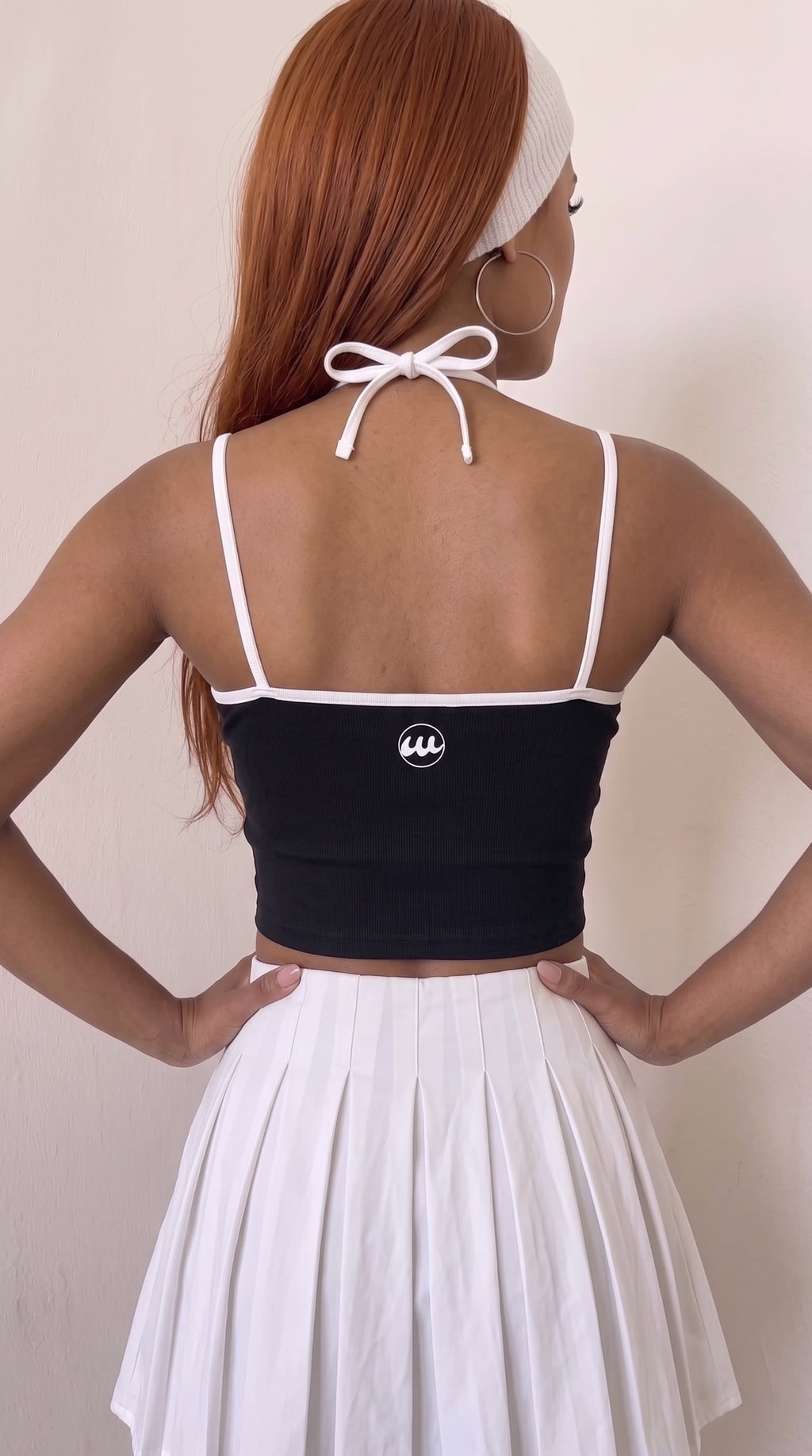 wrapd contrast-binding halter tank in onyx, back view on model