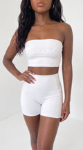 wrapd high-waisted pocket biker short in white, front view on model