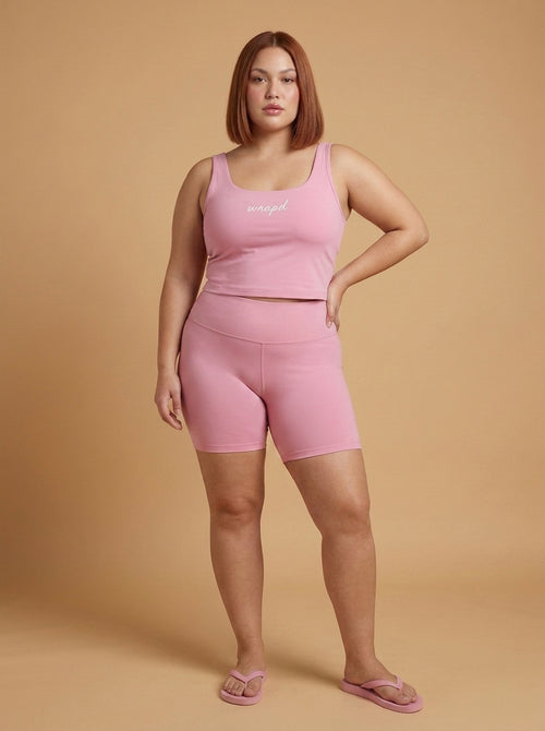 wrapd cropped tank in pink, front view on model