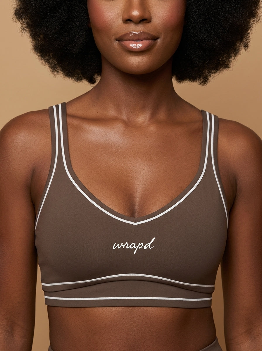 wrapd topstitching sports bra, close-up detail of contrast topstitching