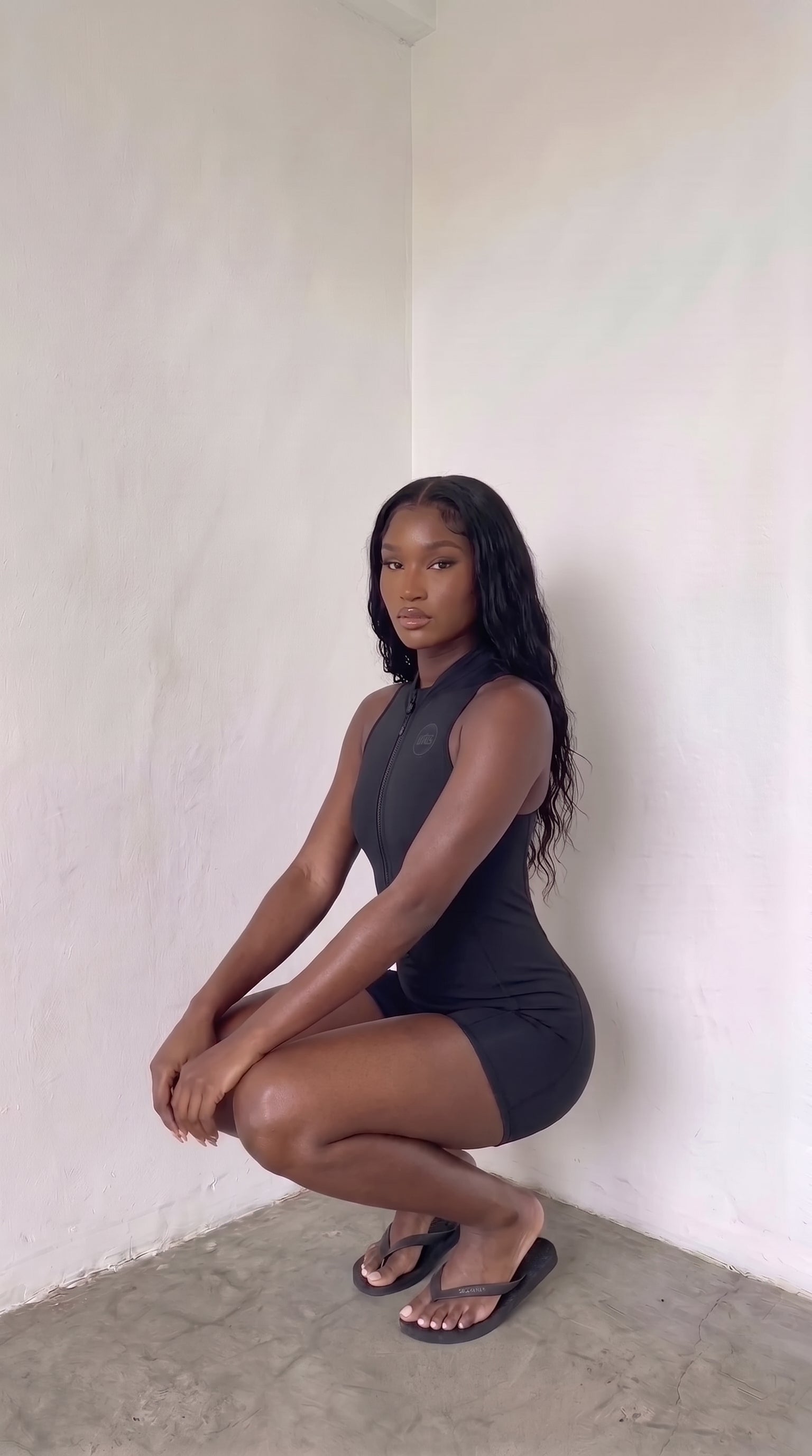 wrapd quarter-zip yoga romper (onyx)